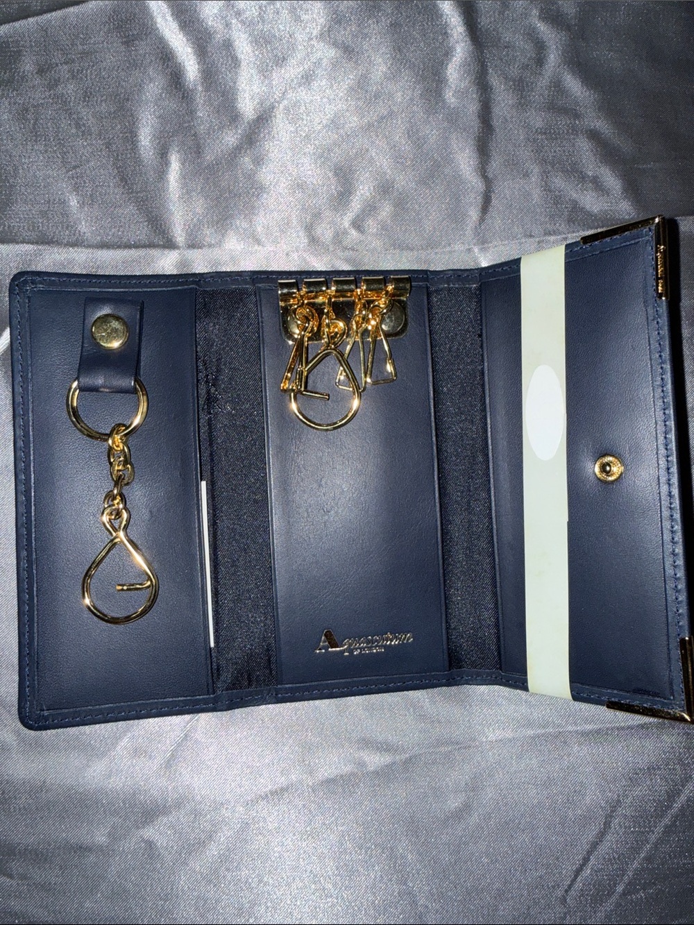 Aquascutum London Navy Leather Key Case with Cream Stripe and Gold Accents
